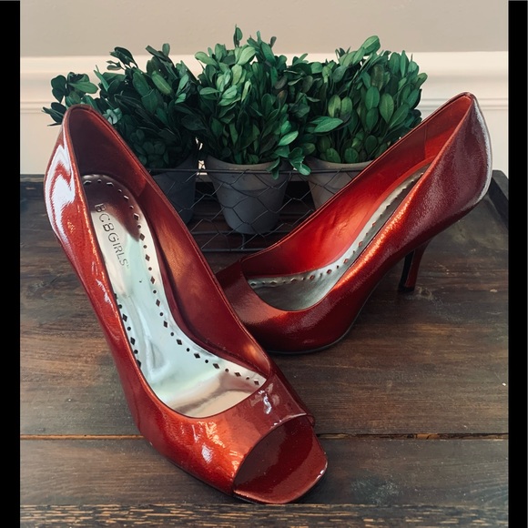 BCBG Patent Leather Peep Toe
Heels, Ruby Red Pumps, Sandals - Picture 2 of 5